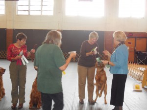 Even the dog is happy to get his award!